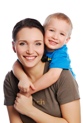 Young mother with 3 year old boy hugging her